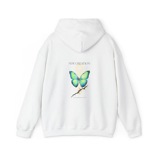 Christian hoodie featuring a blue and green butterfly rising above a cracked rock, symbolizing transformation and renewal. The design includes the words 'NEW CREATION' at the top and '2 Corinthians 5:17' at the bottom, representing the Bible verse about becoming a new creation in Christ.