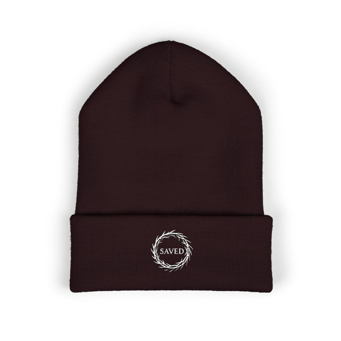 Brown Christian beanie with embroidered “Saved” text inside a crown of thorns, minimalist faith-based winter hat, unisex cuffed beanie, Christian streetwear accessory, gospel-inspired apparel on white background.
