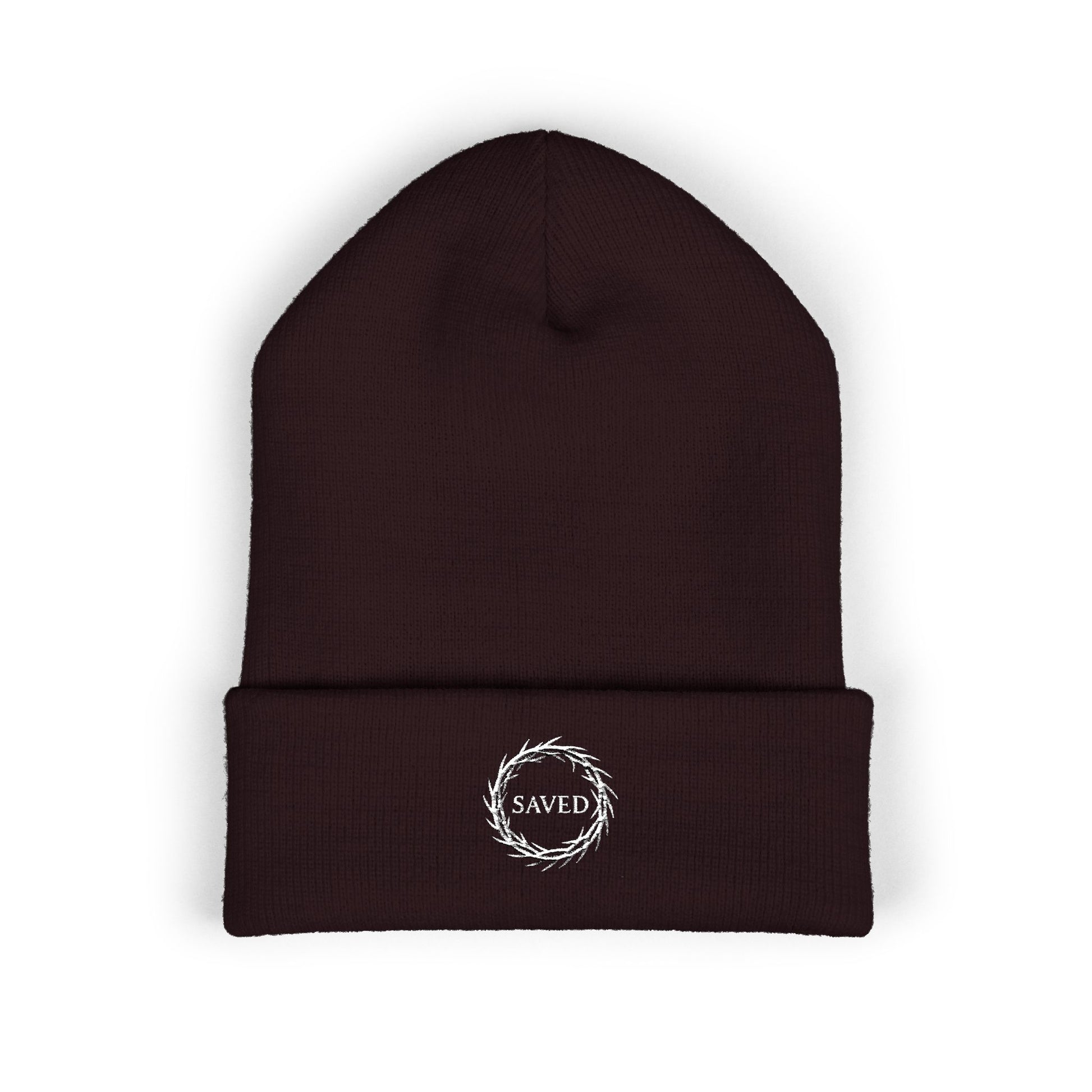 Brown Christian beanie with embroidered “Saved” text inside a crown of thorns, minimalist faith-based winter hat, unisex cuffed beanie, Christian streetwear accessory, gospel-inspired apparel on white background.