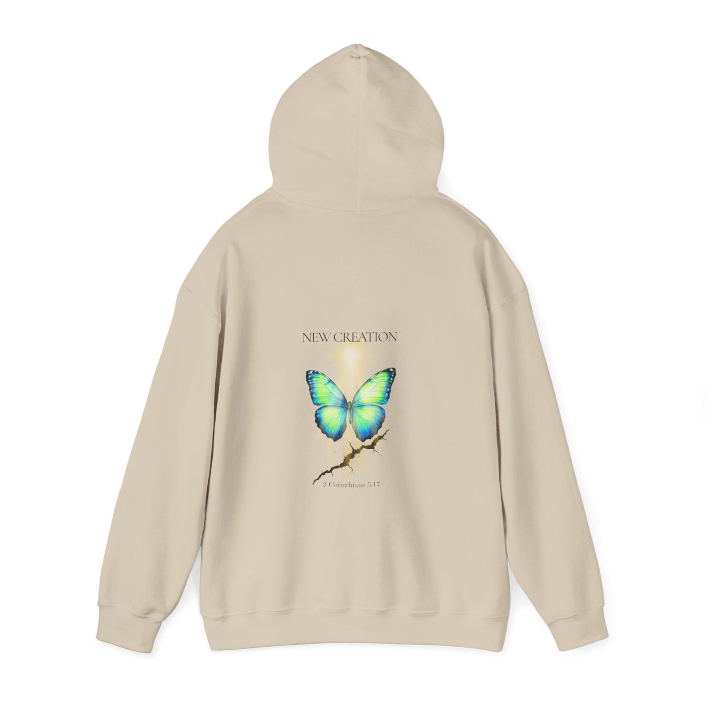 Christian hoodie with the hood up featuring a blue and green butterfly rising above a cracked rock, symbolizing transformation and renewal. The design includes the words 'NEW CREATION' at the top and '2 Corinthians 5:17' at the bottom, representing the Bible verse about becoming a new creation in Christ.