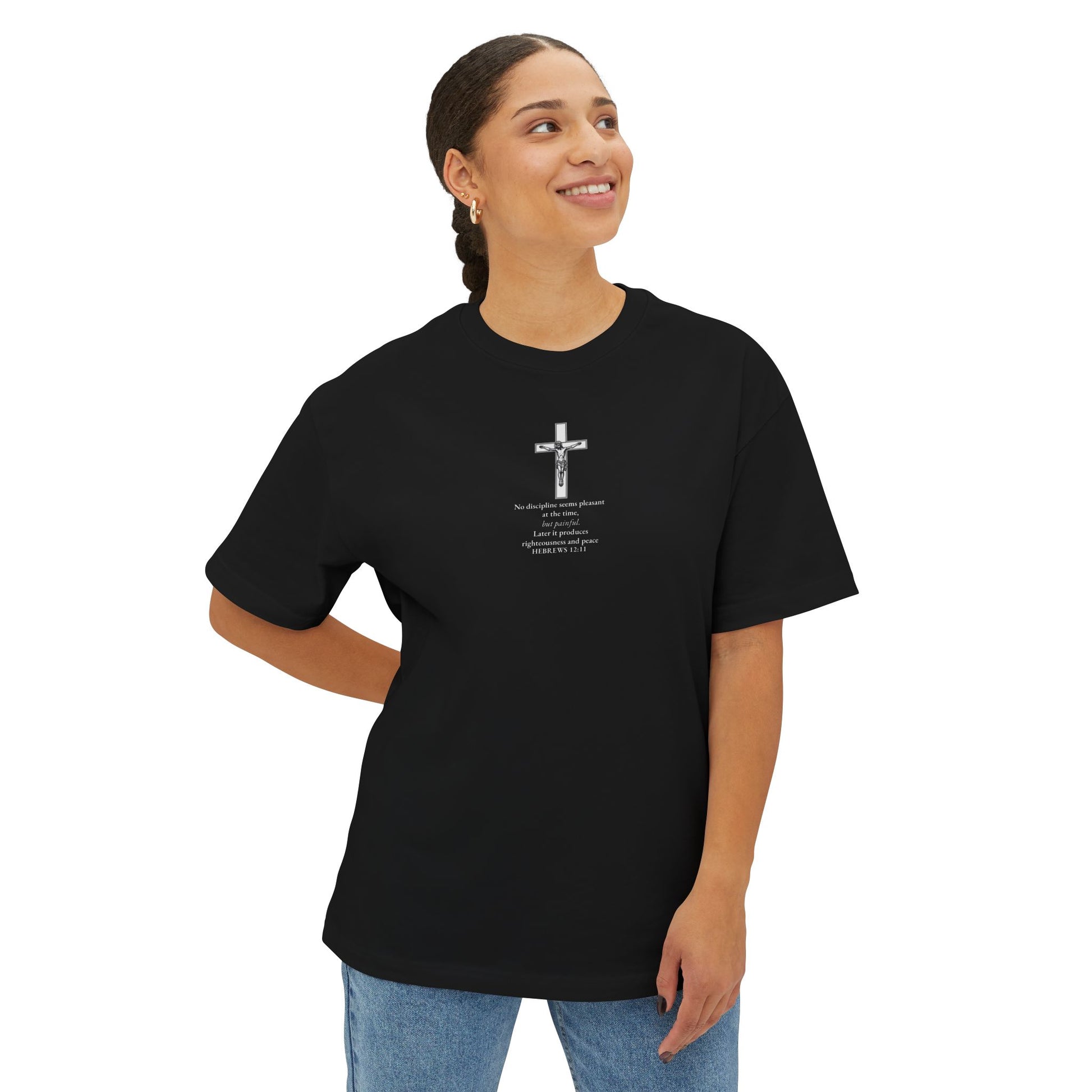 Women wearing a black Hebrews 12:11 Christian t-shirt with bold scripture design — modern Catholic clothing and Orthodox clothing for men and women seeking spiritual growth and encouragement.