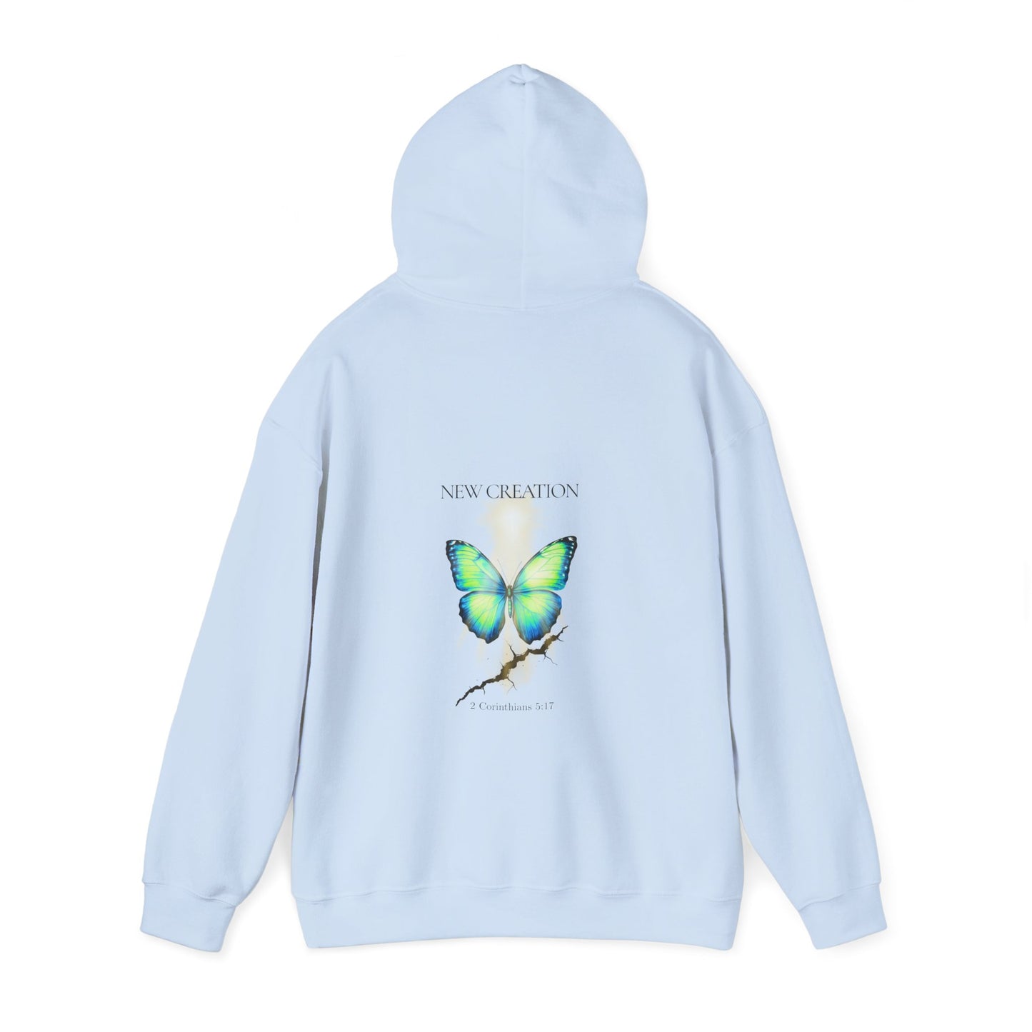 Christian hoodie with the hood up featuring a blue and green butterfly rising above a cracked rock, symbolizing transformation and renewal. The design includes the words 'NEW CREATION' at the top and '2 Corinthians 5:17' at the bottom, representing the Bible verse about becoming a new creation in Christ.
