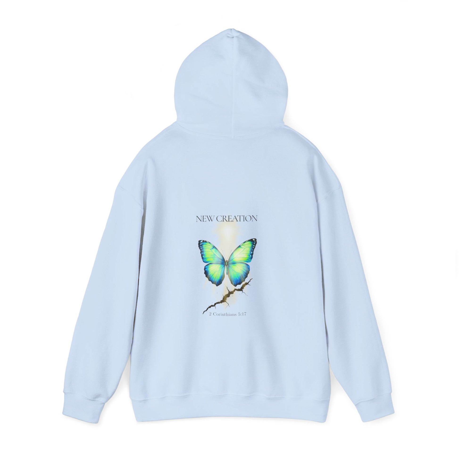Christian hoodie with the hood up featuring a blue and green butterfly rising above a cracked rock, symbolizing transformation and renewal. The design includes the words 'NEW CREATION' at the top and '2 Corinthians 5:17' at the bottom, representing the Bible verse about becoming a new creation in Christ.