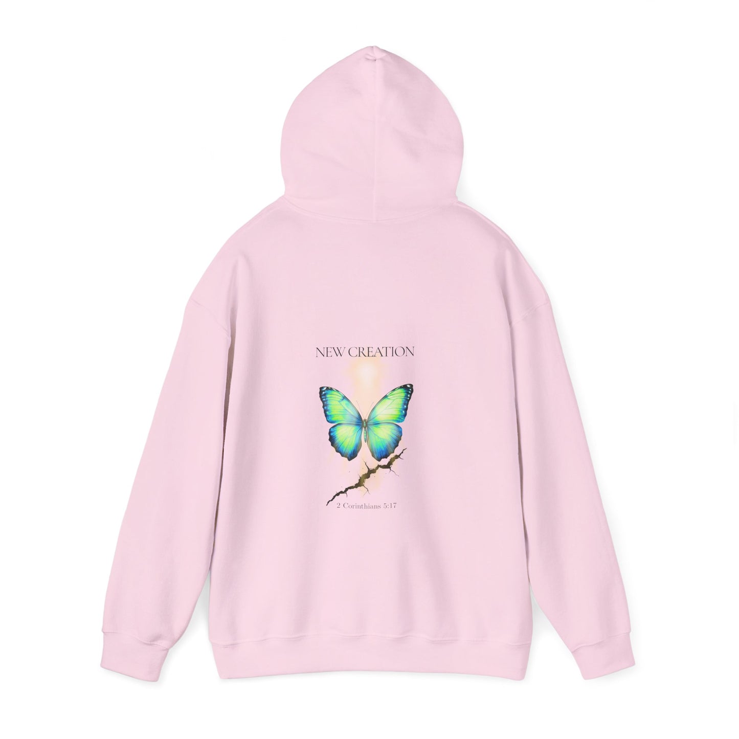 Christian hoodie with the hood up featuring a blue and green butterfly rising above a cracked rock, symbolizing transformation and renewal. The design includes the words 'NEW CREATION' at the top and '2 Corinthians 5:17' at the bottom, representing the Bible verse about becoming a new creation in Christ.