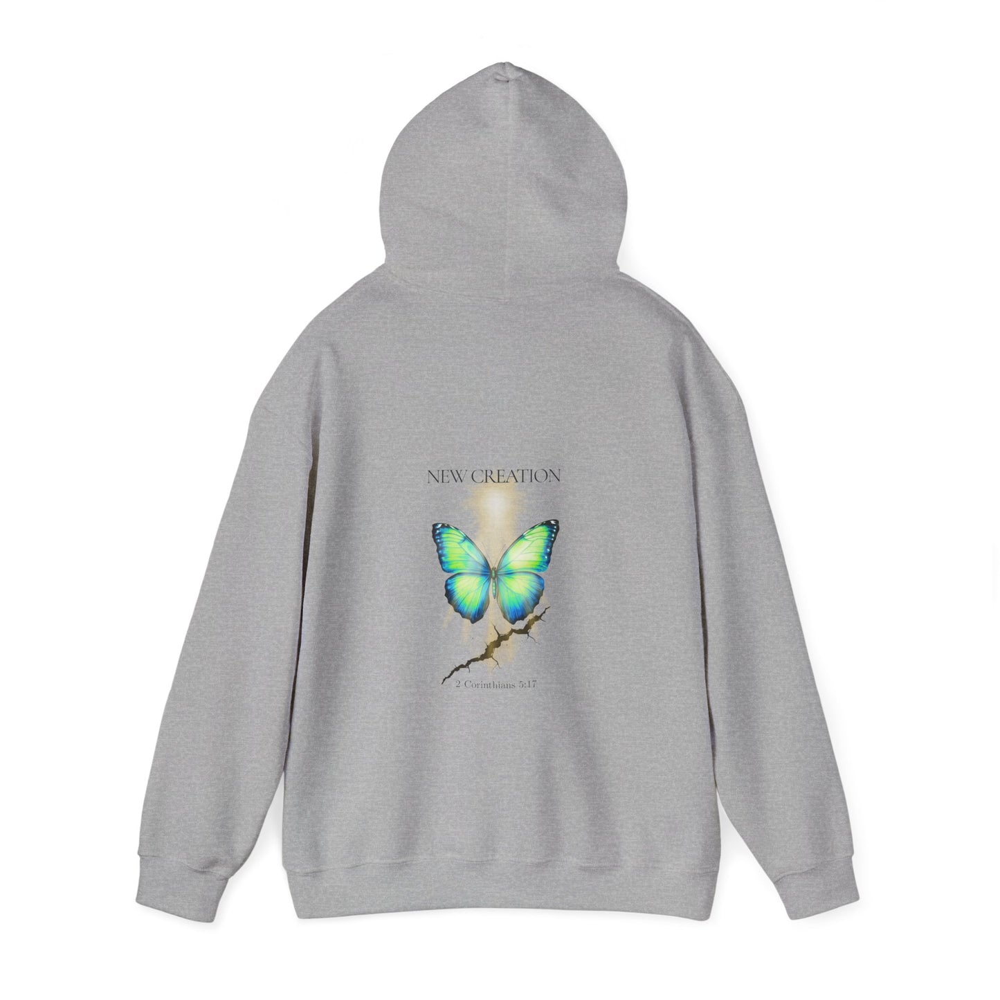 Christian hoodie with the hood up featuring a blue and green butterfly rising above a cracked rock, symbolizing transformation and renewal. The design includes the words 'NEW CREATION' at the top and '2 Corinthians 5:17' at the bottom, representing the Bible verse about becoming a new creation in Christ.