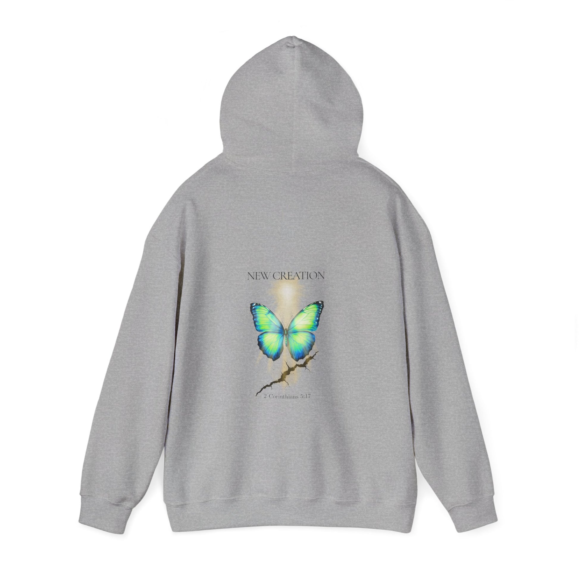Christian hoodie with the hood up featuring a blue and green butterfly rising above a cracked rock, symbolizing transformation and renewal. The design includes the words 'NEW CREATION' at the top and '2 Corinthians 5:17' at the bottom, representing the Bible verse about becoming a new creation in Christ.